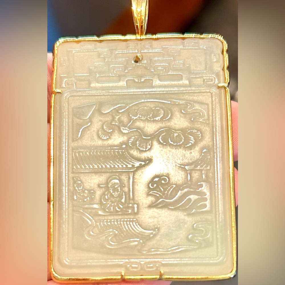 White Jade Pendant in solid 14k.
Intricately Carved Antique Chinese Hetian Jade.